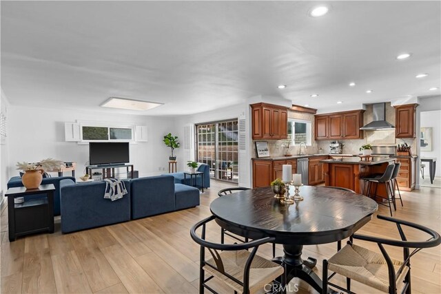 dining room featuring light wood-type flooring