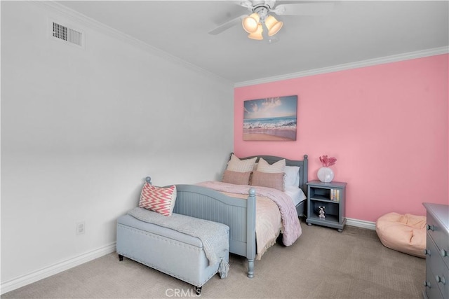 bedroom featuring light carpet, crown molding, and ceiling fan