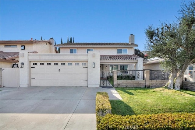 mediterranean / spanish-style home featuring a front yard