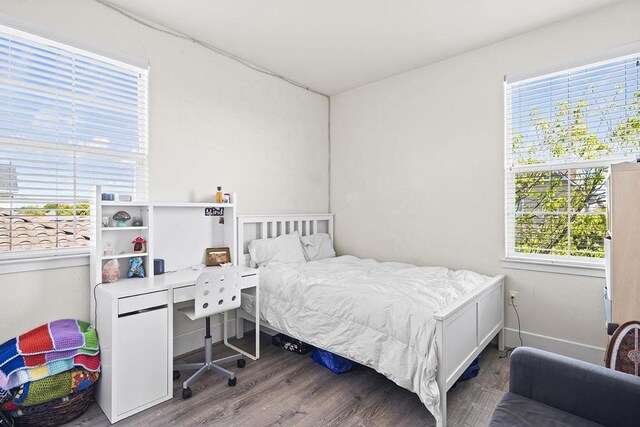 bedroom featuring wood-type flooring