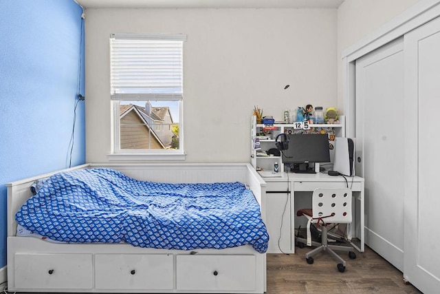 bedroom featuring hardwood / wood-style flooring