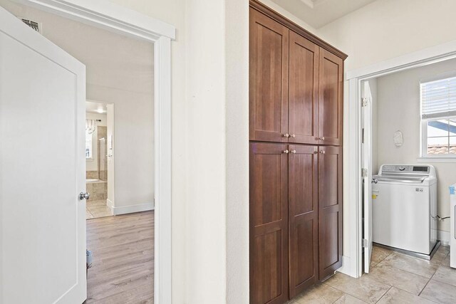 laundry room with washer / dryer