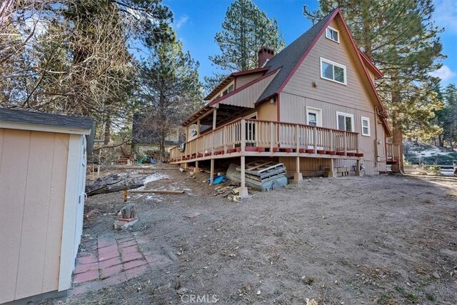 rear view of house with a deck