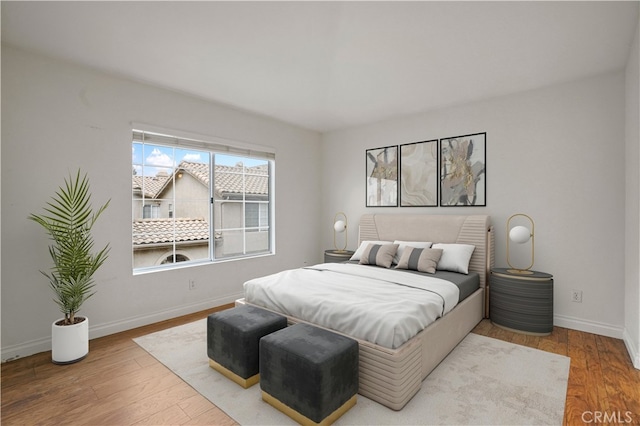 bedroom featuring hardwood / wood-style floors