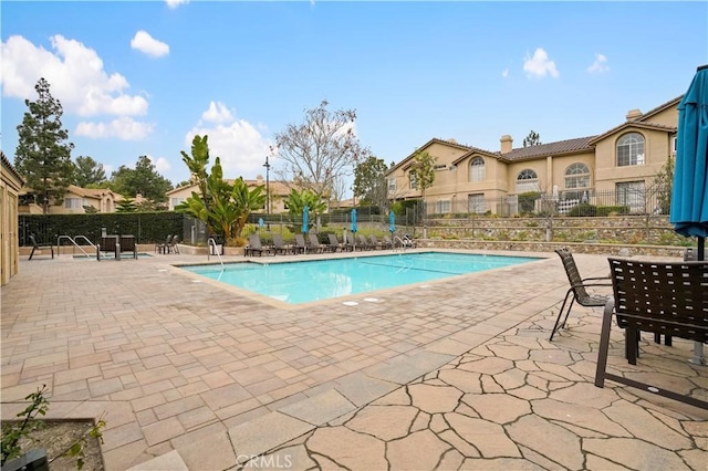 view of pool with a patio