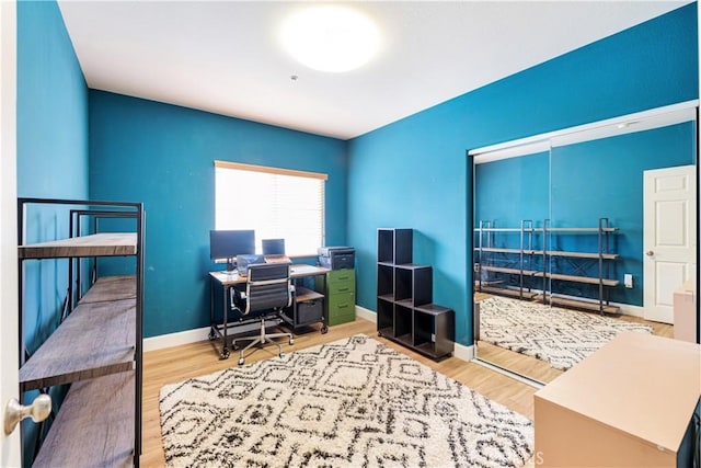 office area with light wood-type flooring