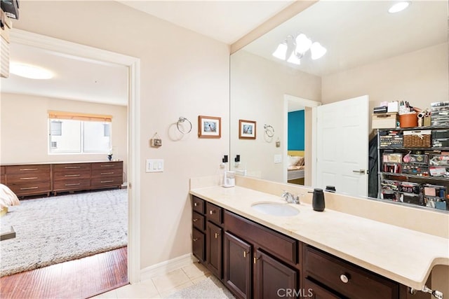 bathroom with vanity and tile patterned floors