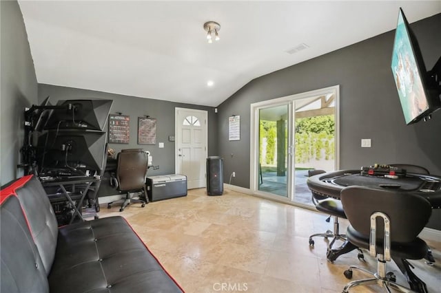 office area featuring vaulted ceiling