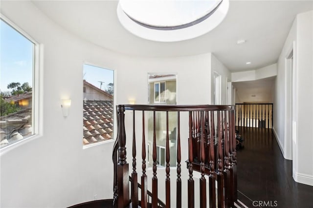 corridor featuring hardwood / wood-style flooring