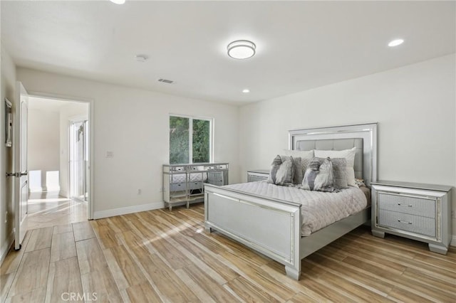 bedroom featuring light wood-type flooring