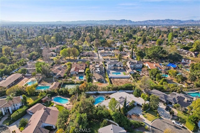 bird's eye view with a mountain view