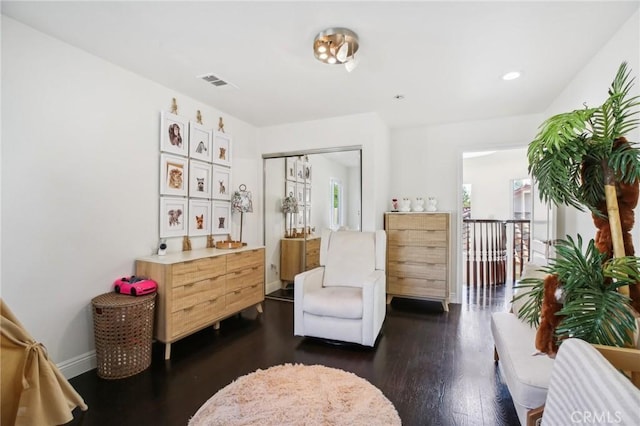 sitting room featuring dark hardwood / wood-style floors