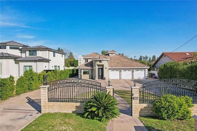 view of front of home with a garage