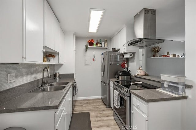 kitchen featuring white cabinets, range hood, sink, and electric range