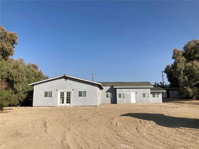 21483 Main St, Barstow, CA 92311 - rear view of property with french doors