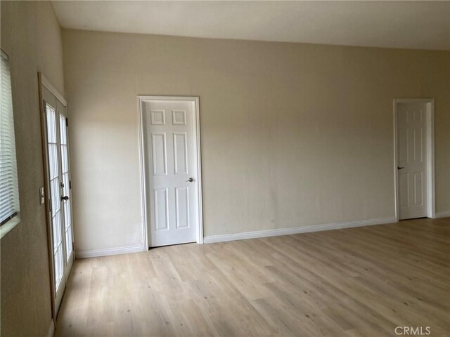 21483 Main St, Barstow, CA 92311 - empty room with light hardwood / wood-style floors