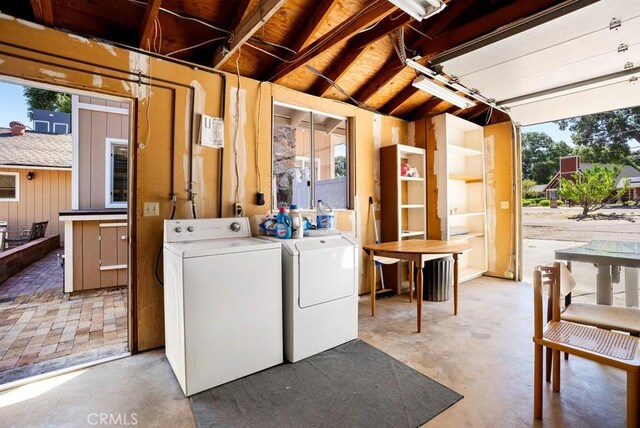 laundry room featuring washer and clothes dryer