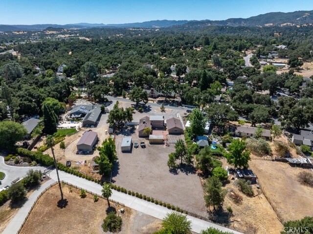 drone / aerial view featuring a mountain view