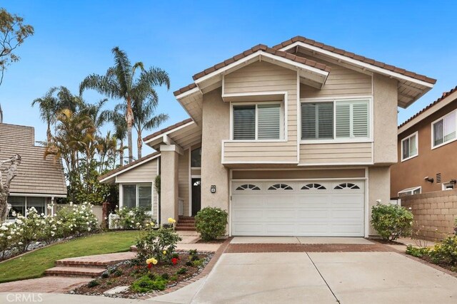 view of front of property featuring a garage