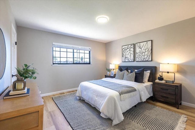 bedroom featuring light wood-type flooring