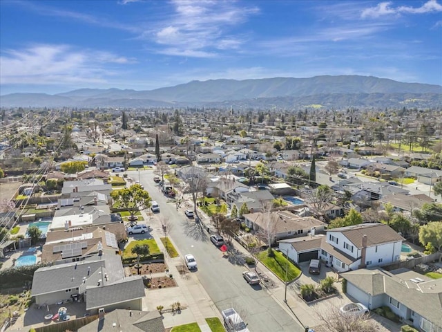 drone / aerial view featuring a mountain view