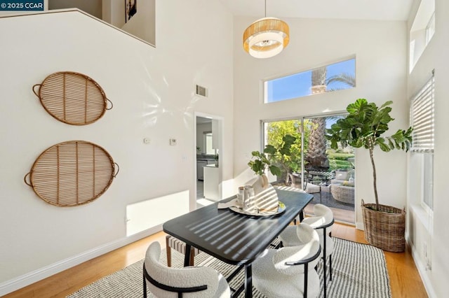 dining room with light hardwood / wood-style floors