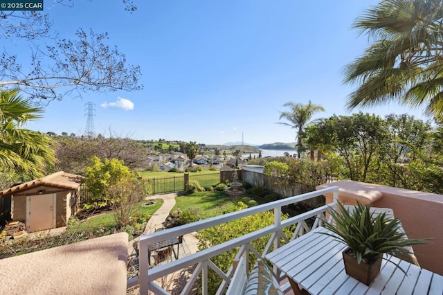 balcony featuring a water view