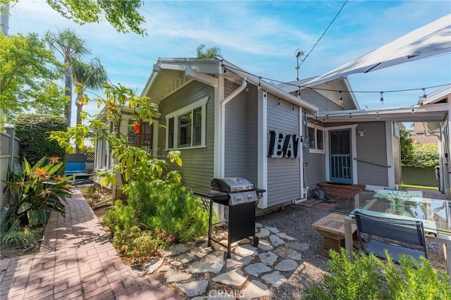 back of property with a patio area