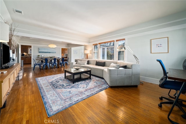 living room with dark hardwood / wood-style floors