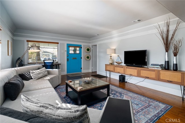 living room with dark wood-type flooring