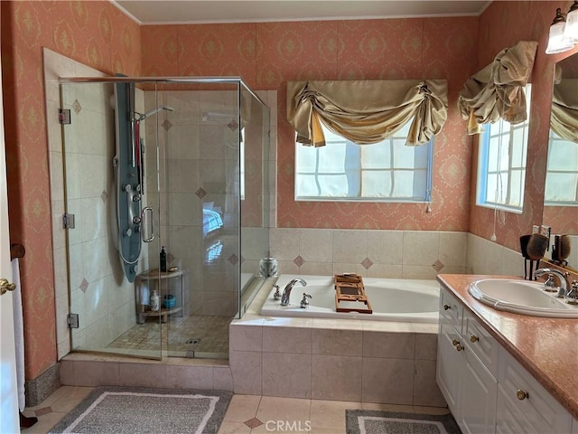 bathroom featuring separate shower and tub, vanity, and tile patterned floors