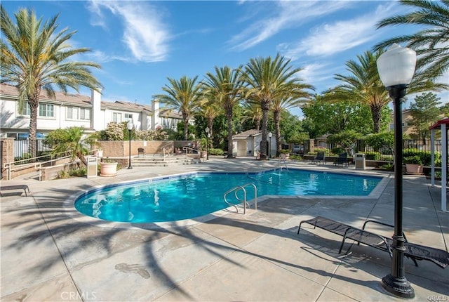 view of pool featuring a patio