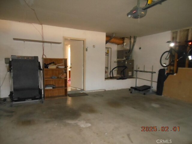 garage with heating unit and a garage door opener