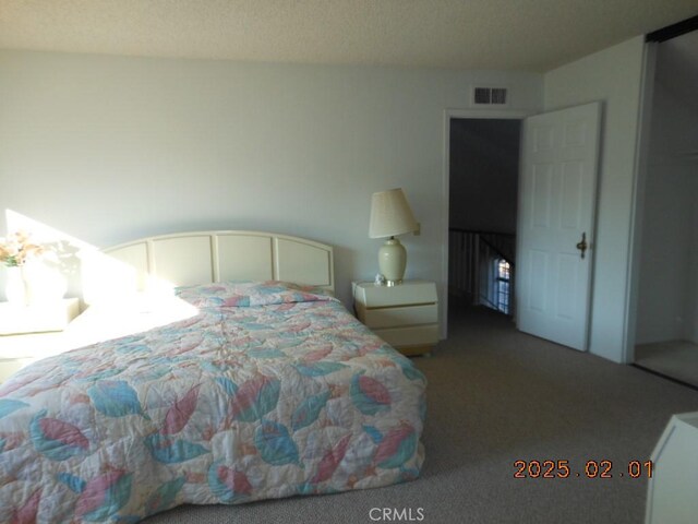 bedroom featuring carpet