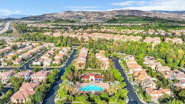 aerial view featuring a mountain view and a residential view