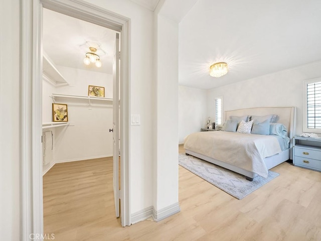 bedroom with light hardwood / wood-style flooring