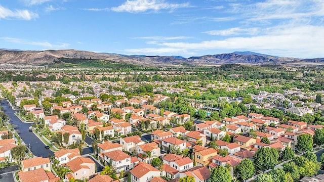 drone / aerial view featuring a mountain view