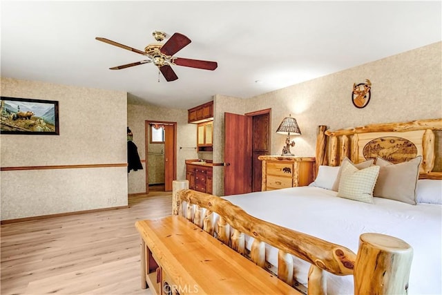 bedroom with ceiling fan and light wood-type flooring