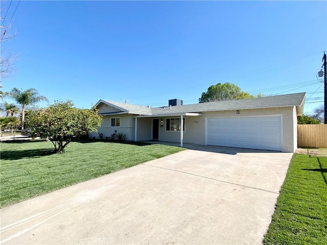 ranch-style house with a garage, fence, concrete driveway, stucco siding, and a front lawn