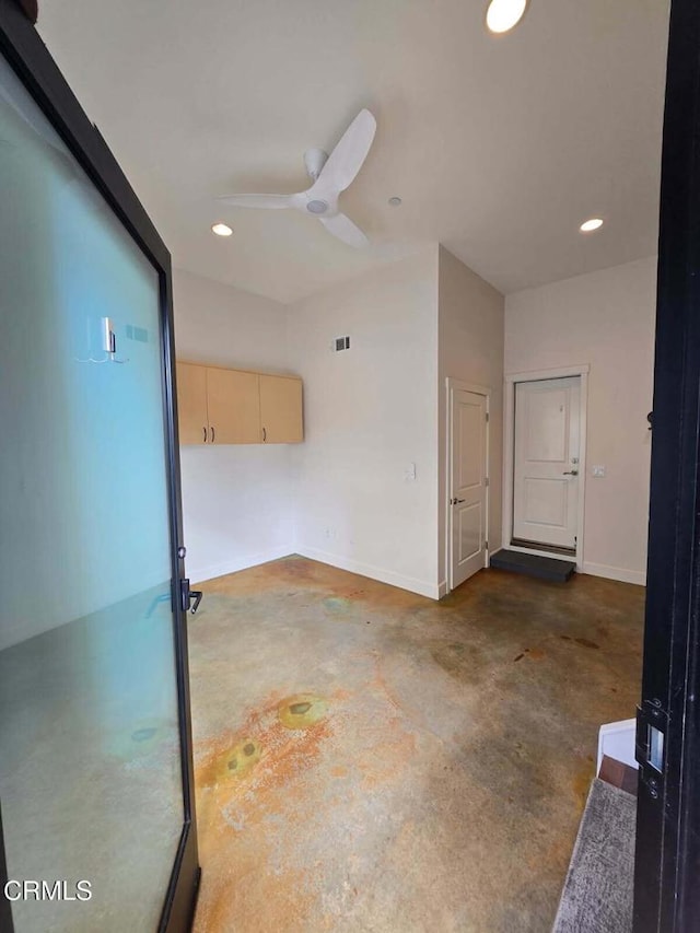 spare room featuring ceiling fan