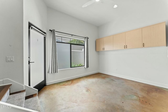 unfurnished room featuring ceiling fan
