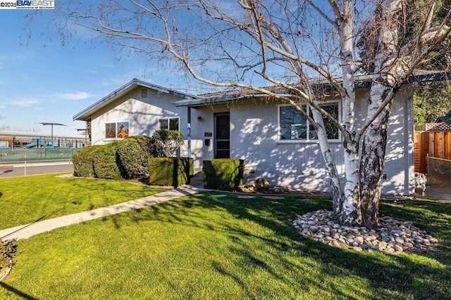 view of front of house with a front yard