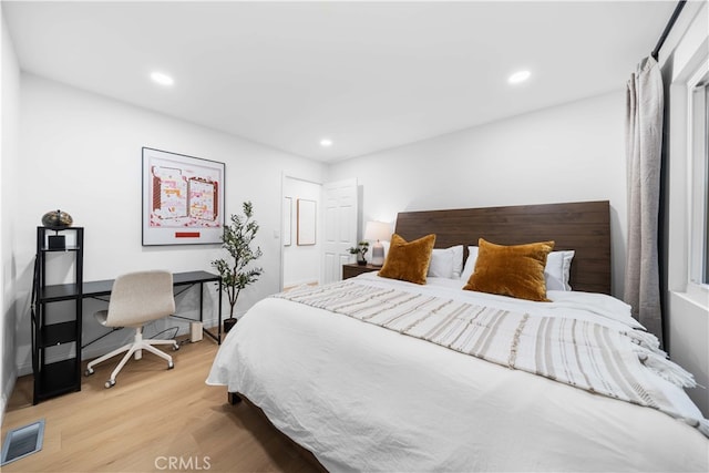 bedroom featuring light hardwood / wood-style flooring