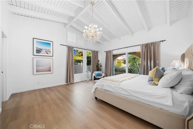 bedroom featuring hardwood / wood-style floors, high vaulted ceiling, beamed ceiling, access to outside, and an inviting chandelier