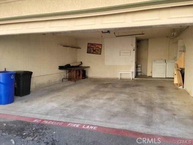 garage with washer and dryer