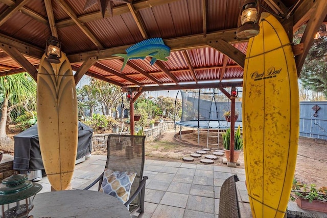 view of patio / terrace with a gazebo and a trampoline