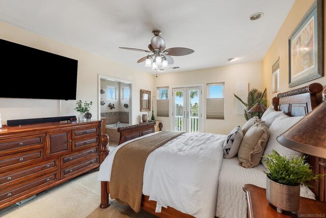 bedroom with french doors, ensuite bathroom, ceiling fan, light colored carpet, and access to exterior