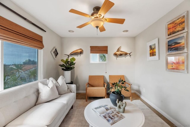 living room featuring ceiling fan