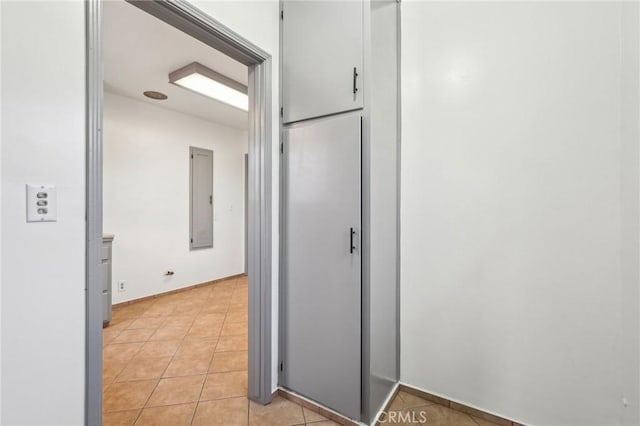 hallway with light tile patterned floors