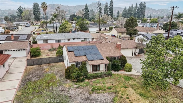 bird's eye view featuring a residential view and a mountain view